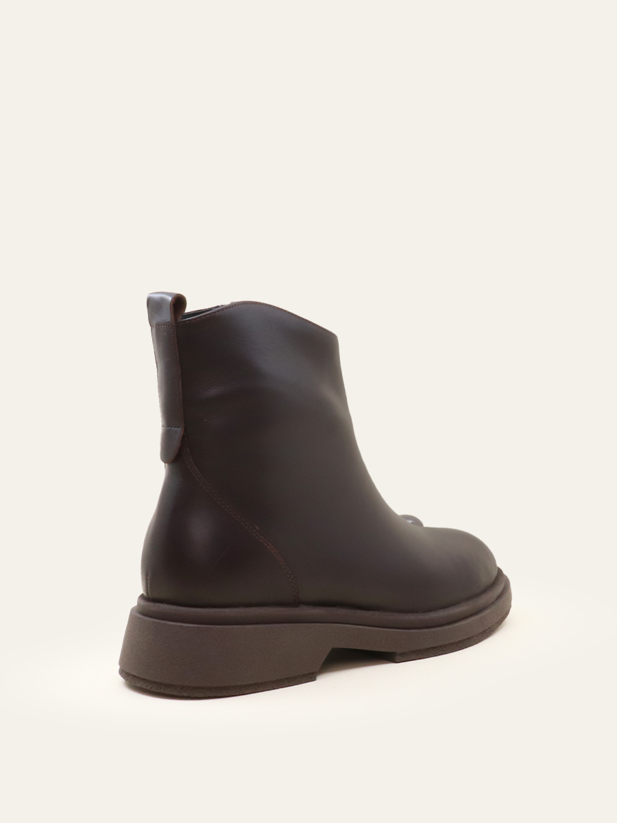 SCULPTED METAL-TOE BOOTS — 7